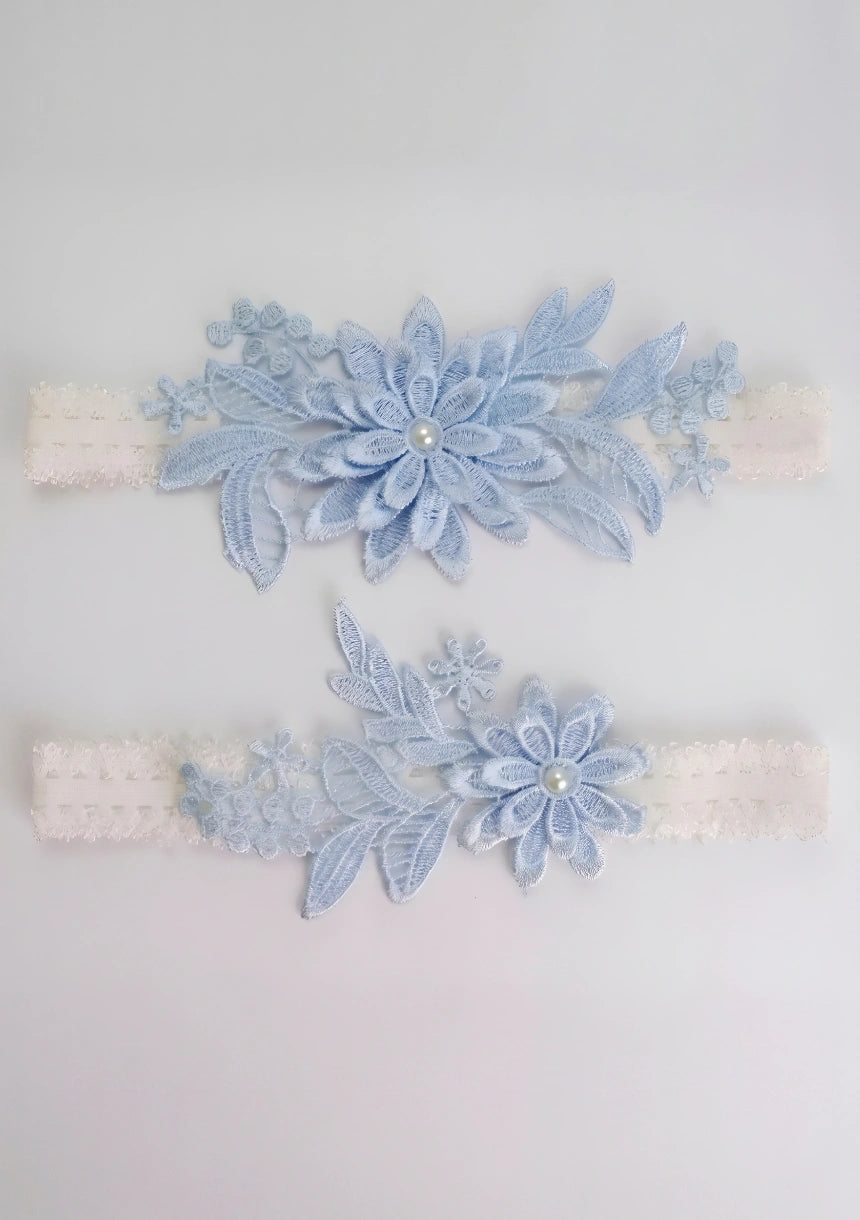 Spitzenblaue Hochzeitsstrumpfband