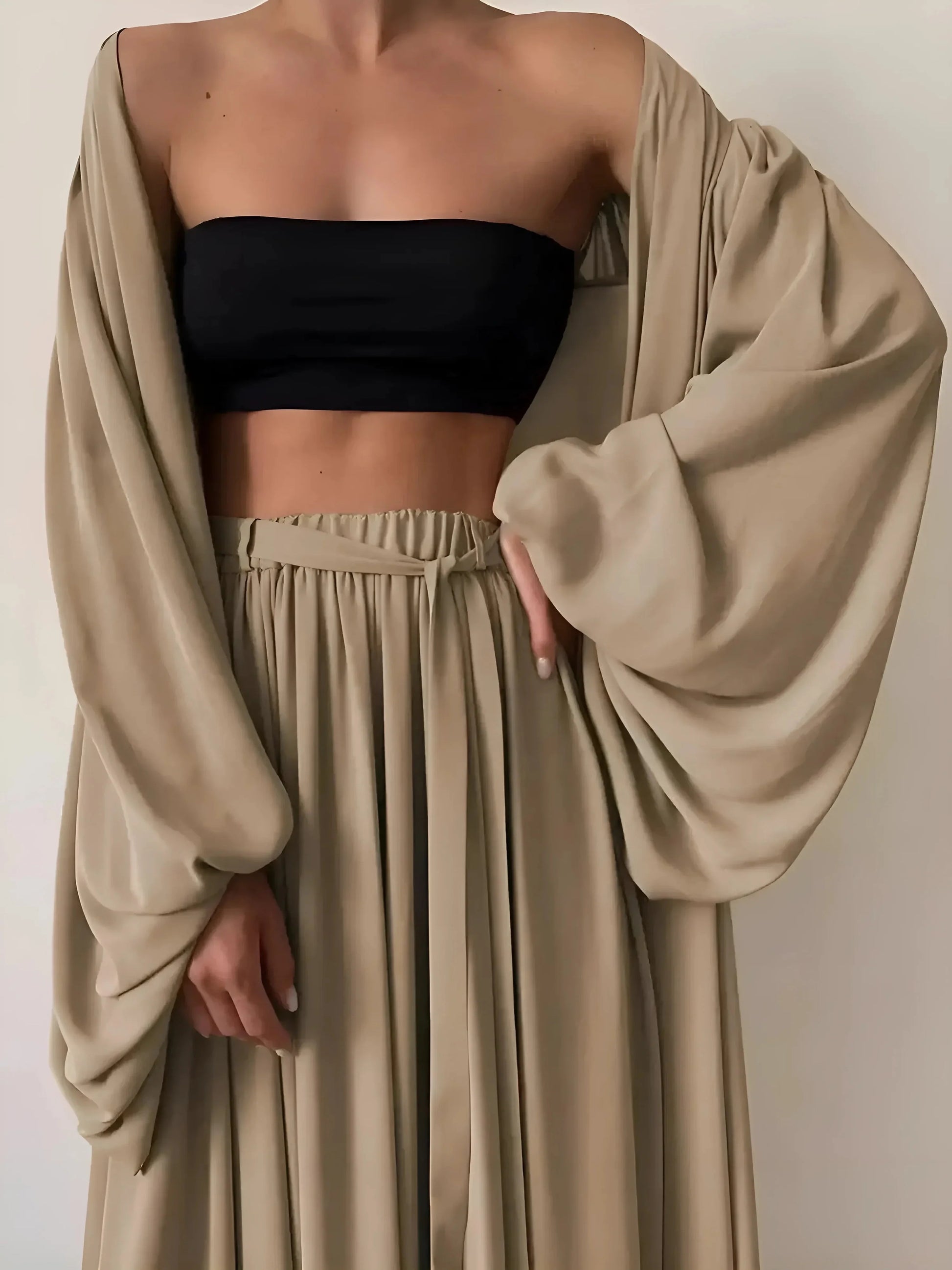 Beige 3-piece loungewear set with a top and long dressing gown