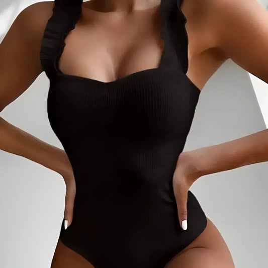 Black One-Piece Swimsuit with Decorative Straps